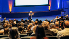 Audience members attending a guest lecture at the Glendale campus.