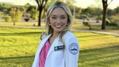 Ashley Parker in white coat