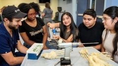 high school students being taught in a clinical setting