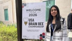 Shireen Arora standing outside Brain Bee event