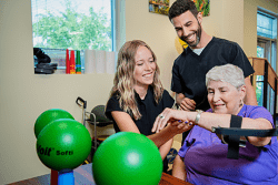 Midwestern University Clinics woman patient receives physical therapy.