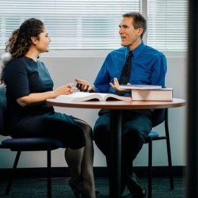 Student and counselor talking