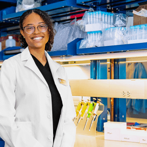 Student posing in laboratory