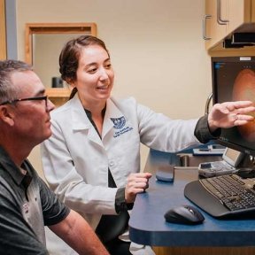 Dr. and patient in the AZ Eye Institute Clinic 