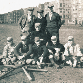older picture of a group of students playing baseball