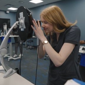 Midwestern University optometry student, Victoria Marshall, practices eye exam in the simulation center.