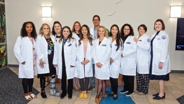 Nurses posing for picture.