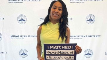 Ashley Jackson showing her match sign for St. Joseph Health, Syracuse N.Y.