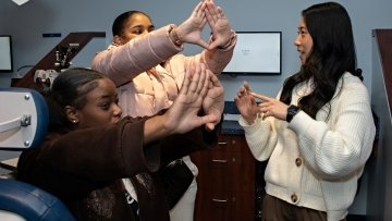 Students conduct vision test during the optometry session.