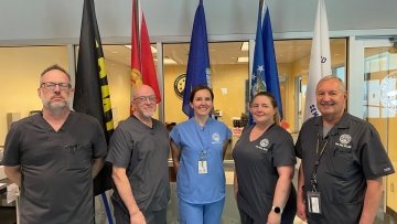 Midwestern Staff and Faculty Military Veterans who work at thse Dental Institute, from left to right: Don Touvell, Dental Lab Coordinator; Wes Reynolds, Dental Lab Manager; Melanie Bauer, D.M.D., Asistant Professor; Ashley Madern, D.M.D., Assistant Professor; Larry Johns, D.D.S., M.S.D., Assistant Professor