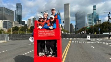Medical students in the booth, serving as spotters in the Chicago Marathon.