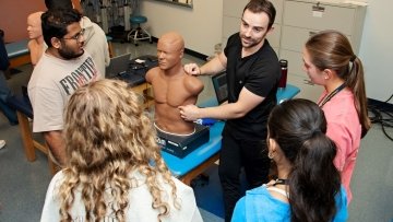 Midwestern student explains heart sounds to high school students