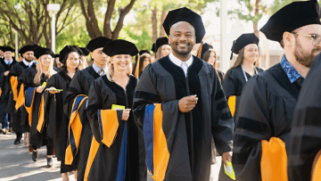 2025 College of Health Science graduates on the Glendale Campus processing to commencement