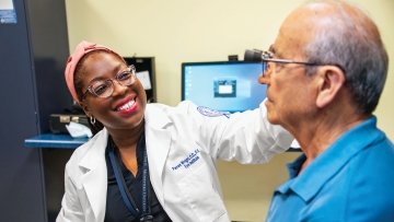 Optomistrist provides health care to patient