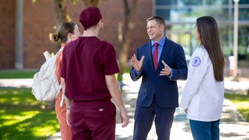 Joshua Baker, O.D., M.S., President and CEO of Midwestern University, speaking candidly with MWU students.
