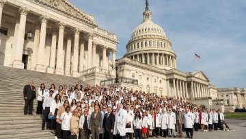 Large group stands on U.S. capitol steps