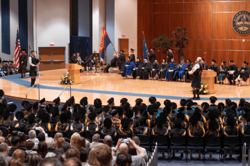 A view of the stage at the College of Health Sciences commencement at Midwestern University's Glendale Campus on June 4, 2025.