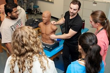 Midwestern student explains heart sounds to high school students