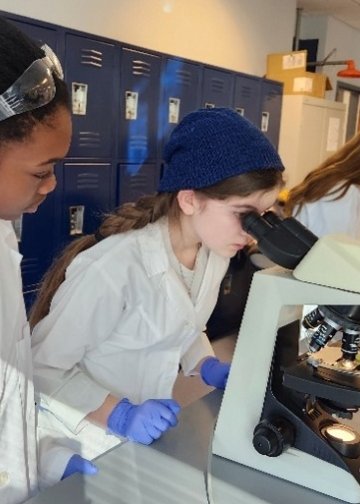 Home-schooled students experience labs at Midwestern University.