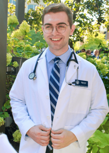 Student in white coat