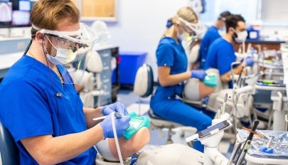 Midwestern University dental medicine students practice in the simulation lab.