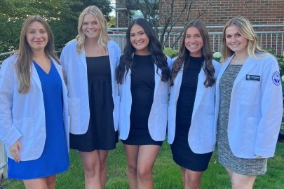 NSSLHA executive board in white coats.