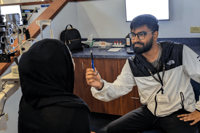 Students practice the NPC test with a pen.