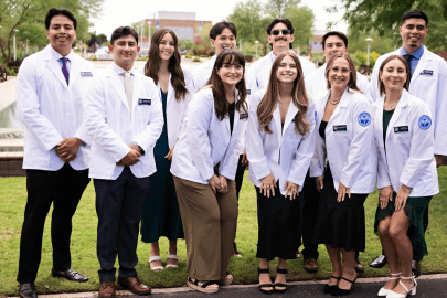 First-year Midwestern University students with their new white coats.