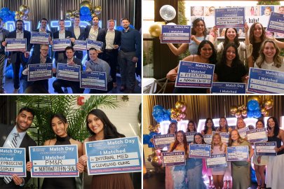 CCOM students hold up Match Day signs