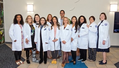 Nurses posing for picture.