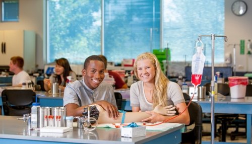 Two High School Seniors Enjoying Midwestern's Health Careers Institute