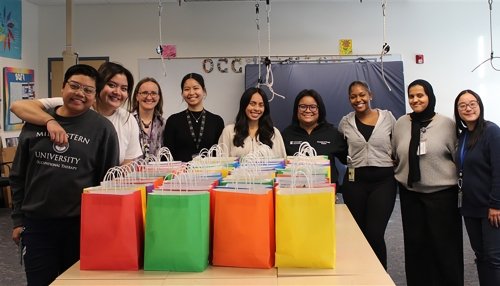 OT Group picture with packed snacks