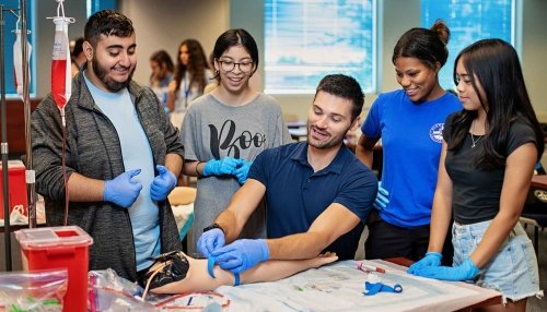 Students learning about health care equipment