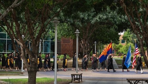 Students line up for the graduation procession. 