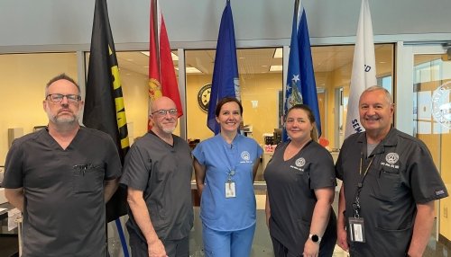 Midwestern Staff and Faculty Military Veterans who work at thse Dental Institute, from left to right: Don Touvell, Dental Lab Coordinator; Wes Reynolds, Dental Lab Manager; Melanie Bauer, D.M.D., Asistant Professor; Ashley Madern, D.M.D., Assistant Professor; Larry Johns, D.D.S., M.S.D., Assistant Professor