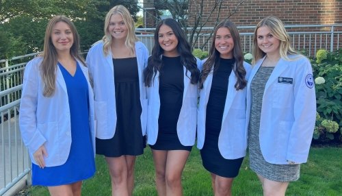 NSSLHA executive board in white coats.