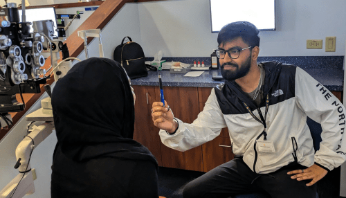 Students practice the NPC test with a pen.