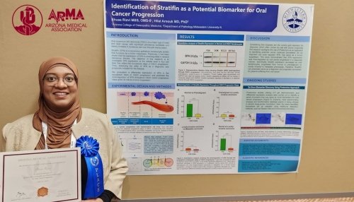 Shuaa Rizvi in front of her poster, won first place at Arizona Medical Association 