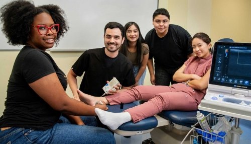 Arizona high school students participating in a hands-on podiatry demonstration at Midwestern University.