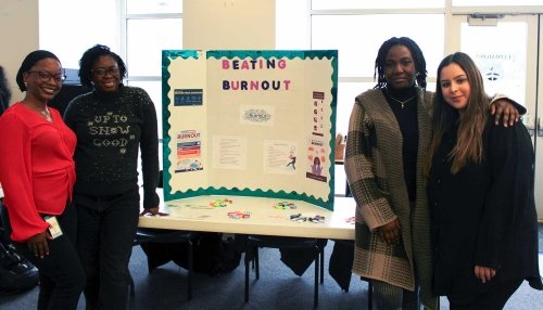 OT students show their burnout poster project.