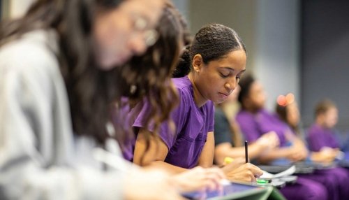 Veterinary Medicine lecture hall with students taking notes