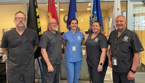 Don Touvell, Wes Reynolds, Melanie Bauer, Ashley Madern, and Larry Johns at the Veteran's Dental Day event.