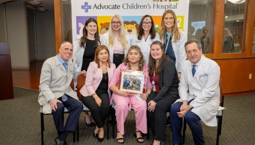 Group poses with transplant recipient