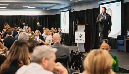 Dr. Joshua Baker, Interim President and CEO of Midwestern University, welcomes attendees of the WESTMARC Healthcare Summit '25 held on June 11, 2025.