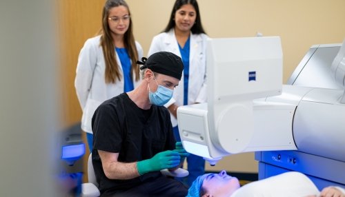 Dr. Robert Fintelmann performing refractive surgery at the Midwestern University Eye Institute.