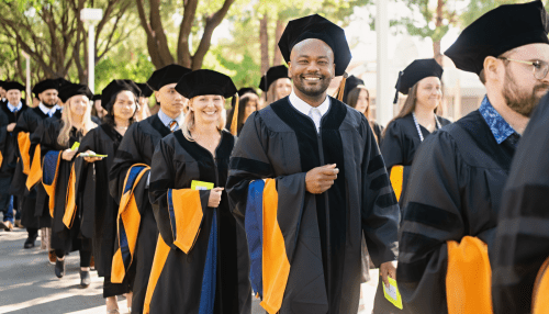 2025 College of Health Science graduates on the Glendale Campus processing to commencement