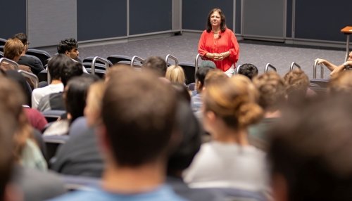 Women speaks to medical students