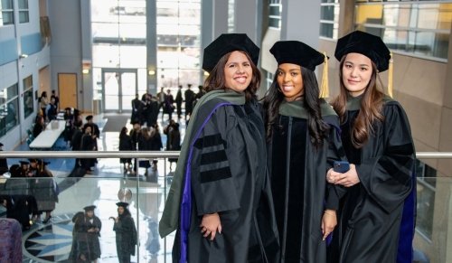 grads with gowns