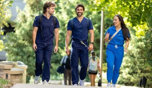 Downers Grove campus with students heading to class.