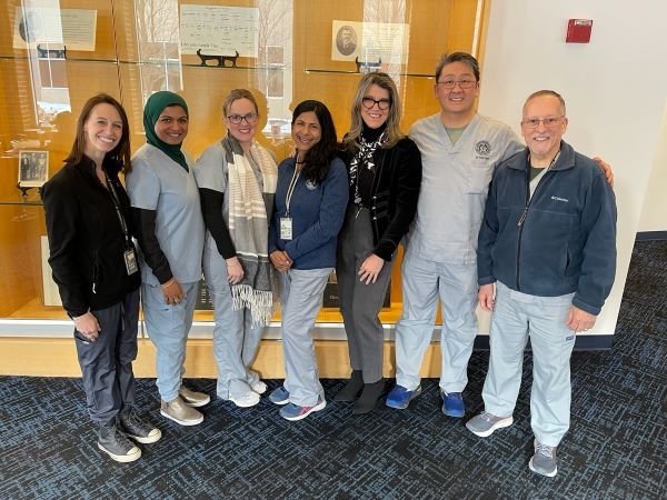 College of Dental Medicine-Illinois faculty pose for a group photo.